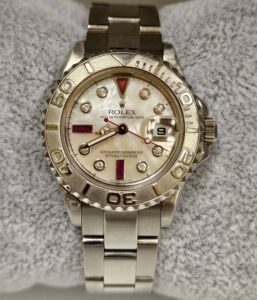 Rolex Ladies Yacht Master 29mm Platinum Bezel Custom Mother of Pearl Diamonds and Ruby Serti Dial169622