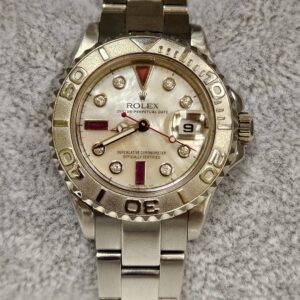 Rolex Ladies Yacht Master 29mm Platinum Bezel Custom Mother of Pearl Diamonds and Ruby Serti Dial169622
